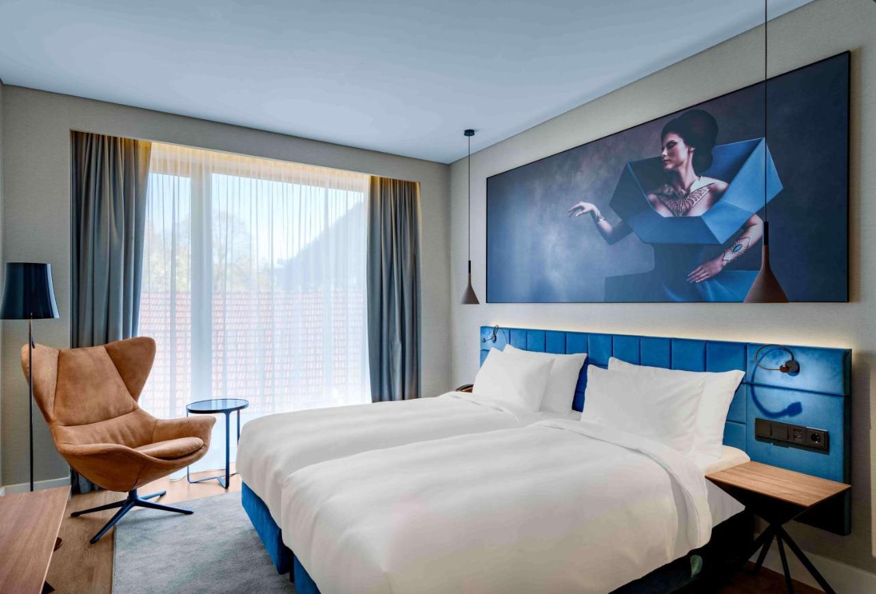 Radisson Blu Aurum Hotel, Brassó Kültér fotó A room at the hotel