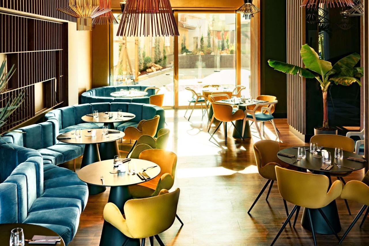 Radisson Blu Aurum Hotel, Brassó Kültér fotó Restaurant interior