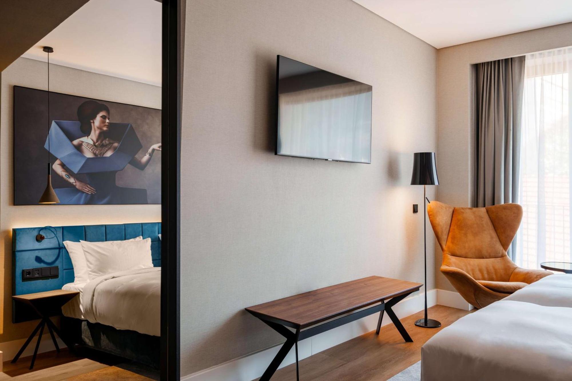 Radisson Blu Aurum Hotel, Brassó Kültér fotó A room at the hotel
